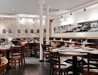 View of the dining room of the St Josep Oriol restaurant.
